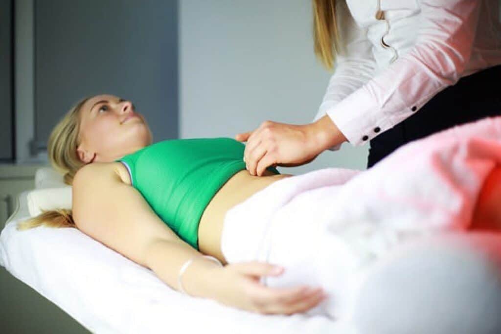 A woman getting examined for fertility acupuncture in Los Angeles.